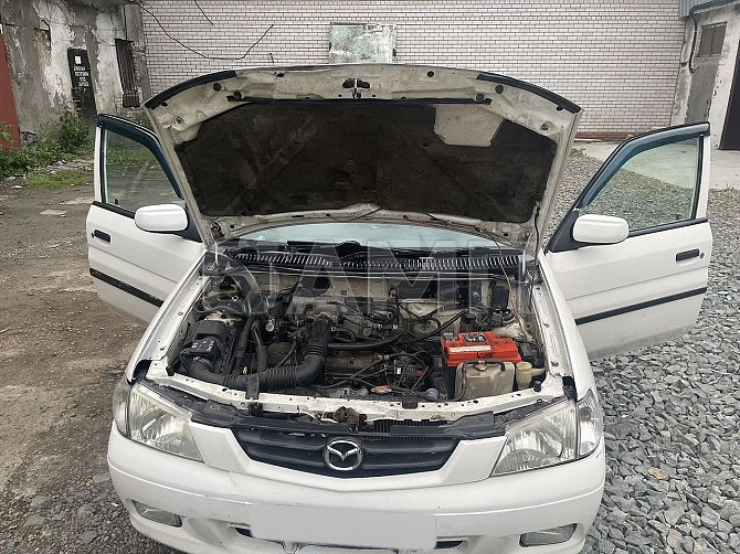 В продаже Mazda Demio 1.5 AT, 1998, 210 000 км Барнаул - изображение 6