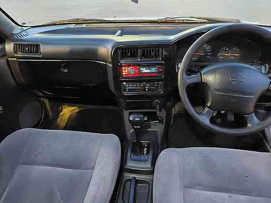 Продам Nissan Wingroad 1.8 AT, 1999, 250 000 км Ачинск